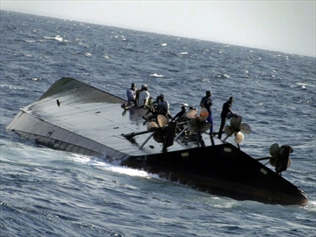 A ferry carrying 200 passengers capsizes near the coastal town of Robersport in Northwest Liberia