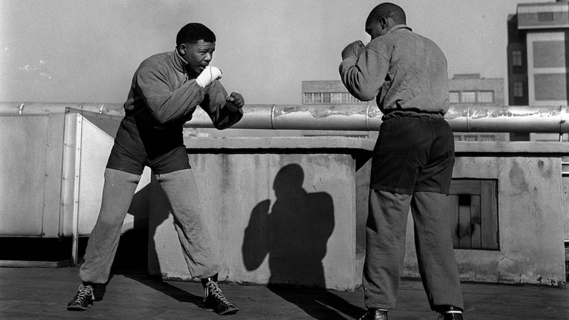 To keep fit, Nelson Mandela, solicitor, was at Jerry Moloiâs boxing gym at Orlando every evening. Heâs shadow-sparring with Moloi (right) a professional featherweight.