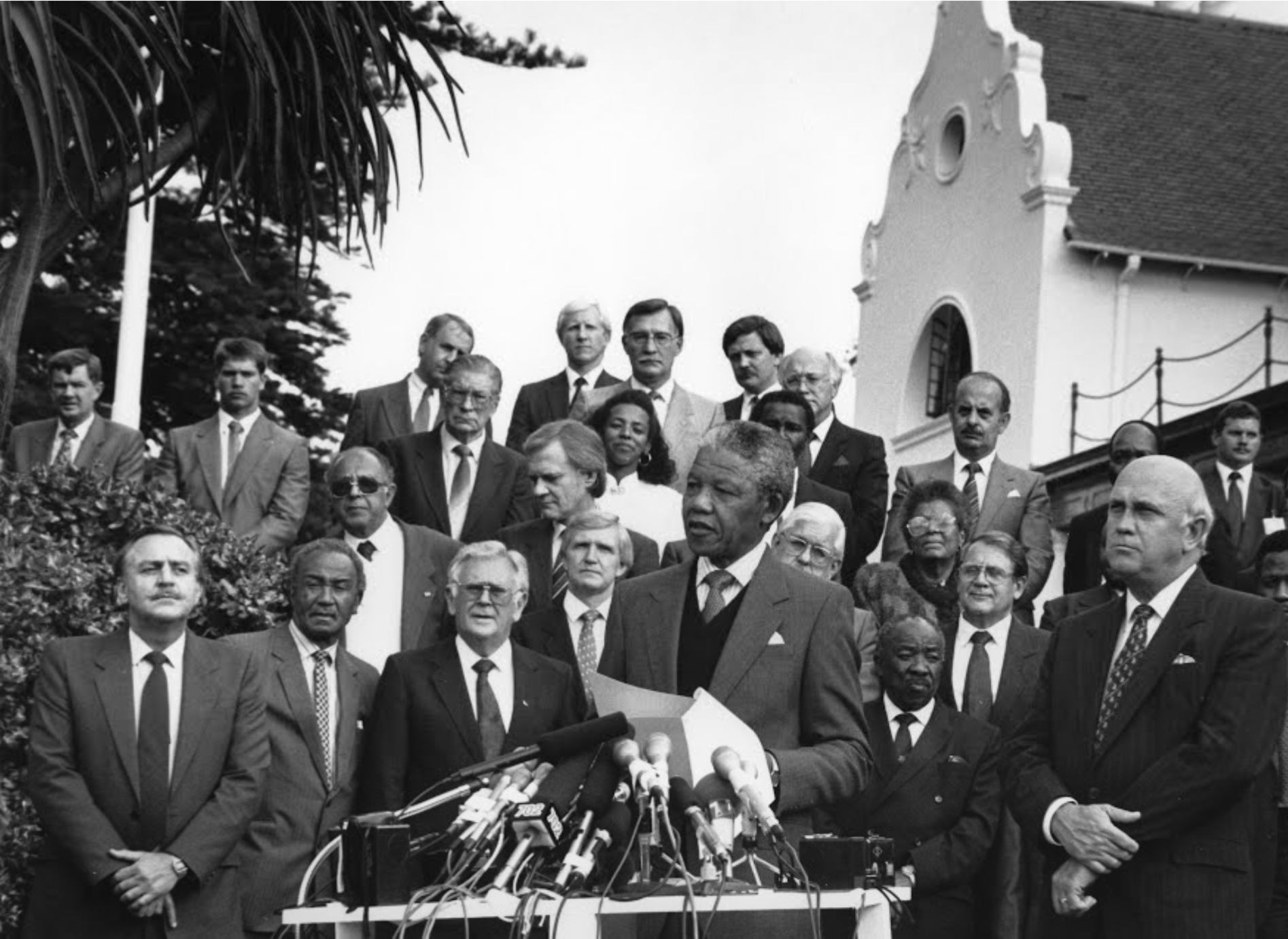 Mandela addressing the press after a meeting between the government and the ANC at Groote Schuur. Image source