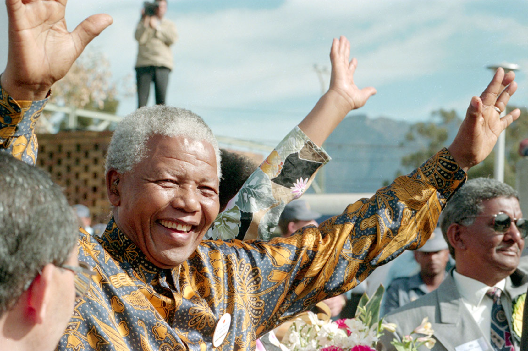 Nobel Laureate and former President of South Africa from 1994 to 1999 Nelson Mandela waves at his audience.Creator: Benny Gool | Credit: Benny Gool / Iconic Images Copyright: © Benny Gool