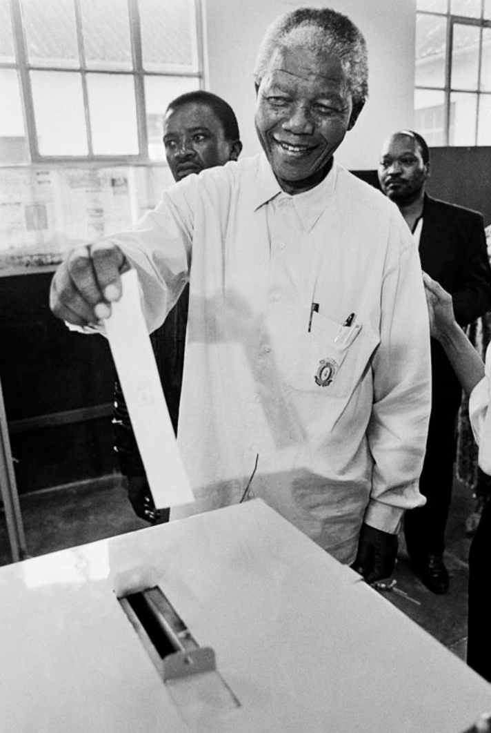 Nelson Mandela casts his vote for the first time in April 1994. Photographer: Paul Weinberg, Permission: Paul Weinberg / South Photos / african.pictures