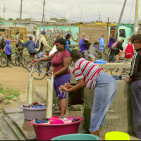 https://footstepstofreedom.co.za/wp-content/gallery/langa-tours/washing-clothes-in-langa.jpg