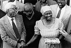 October. From left; Walter Sisulu, Archbishop Desmond Tutu and Albertina Sisulu celebrate Walters release from prison. © unknown