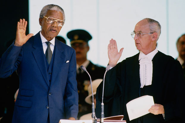 Nelson Mandela is inaugurated as South Africa’s first democratic President