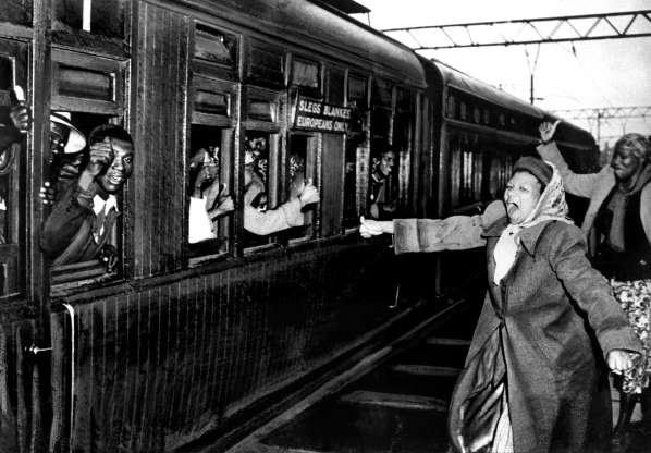 South African resistance fighters occupy train coaches reserved for whites in 1952.