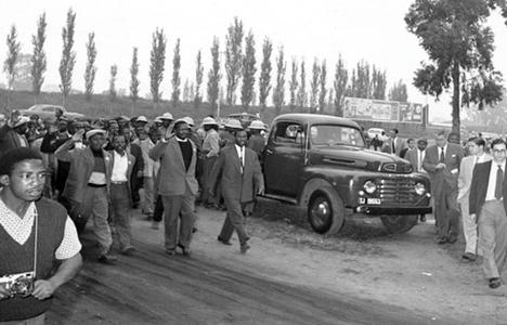 Robert Sobukwe leads marchers during the Anti pass Campaign, 21 March 1960