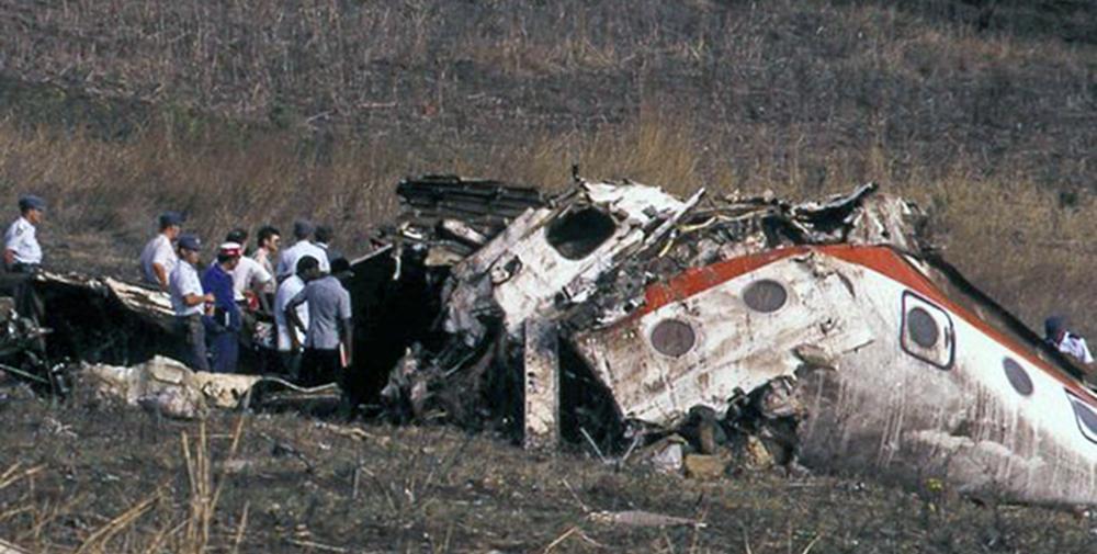 BLOODY SCENE: Investigators at the wreckage of the Russian-built plane that carried Mozambican president Samora Machel and 33 other people which crashed in South Africa two decades ago