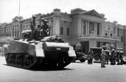 Egyptian army tanks and field guns are drawn up in front of the royal Abdin Palace, in Cairo, on July 26, 1952