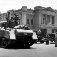 Egyptian army tanks and field guns are drawn up in front of the royal Abdin Palace, in Cairo, on July 26, 1952